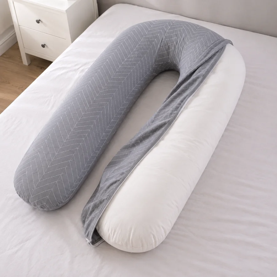 Cover half removed from the pillow, the zip open along its full length